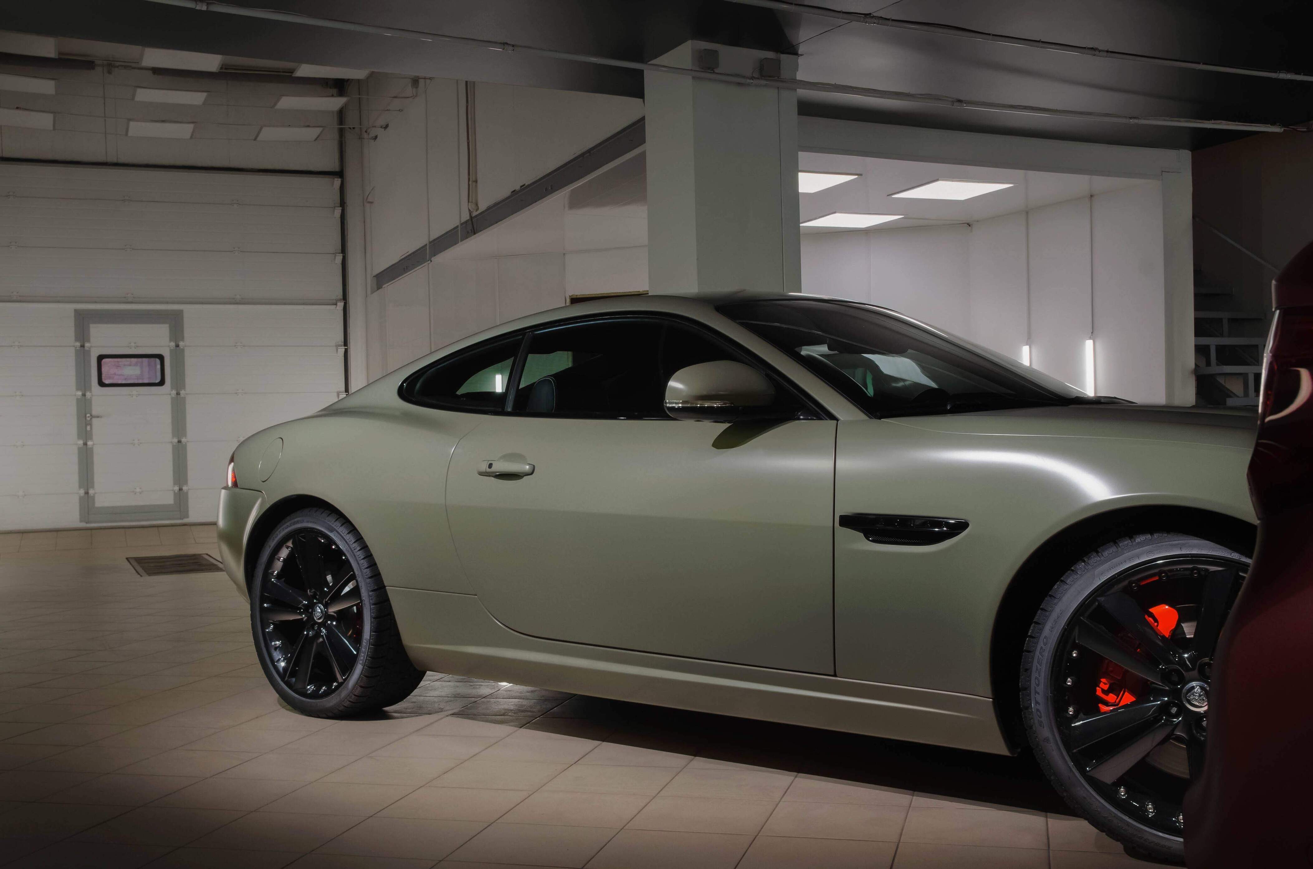 18. Jaguar xk khaki green satin
