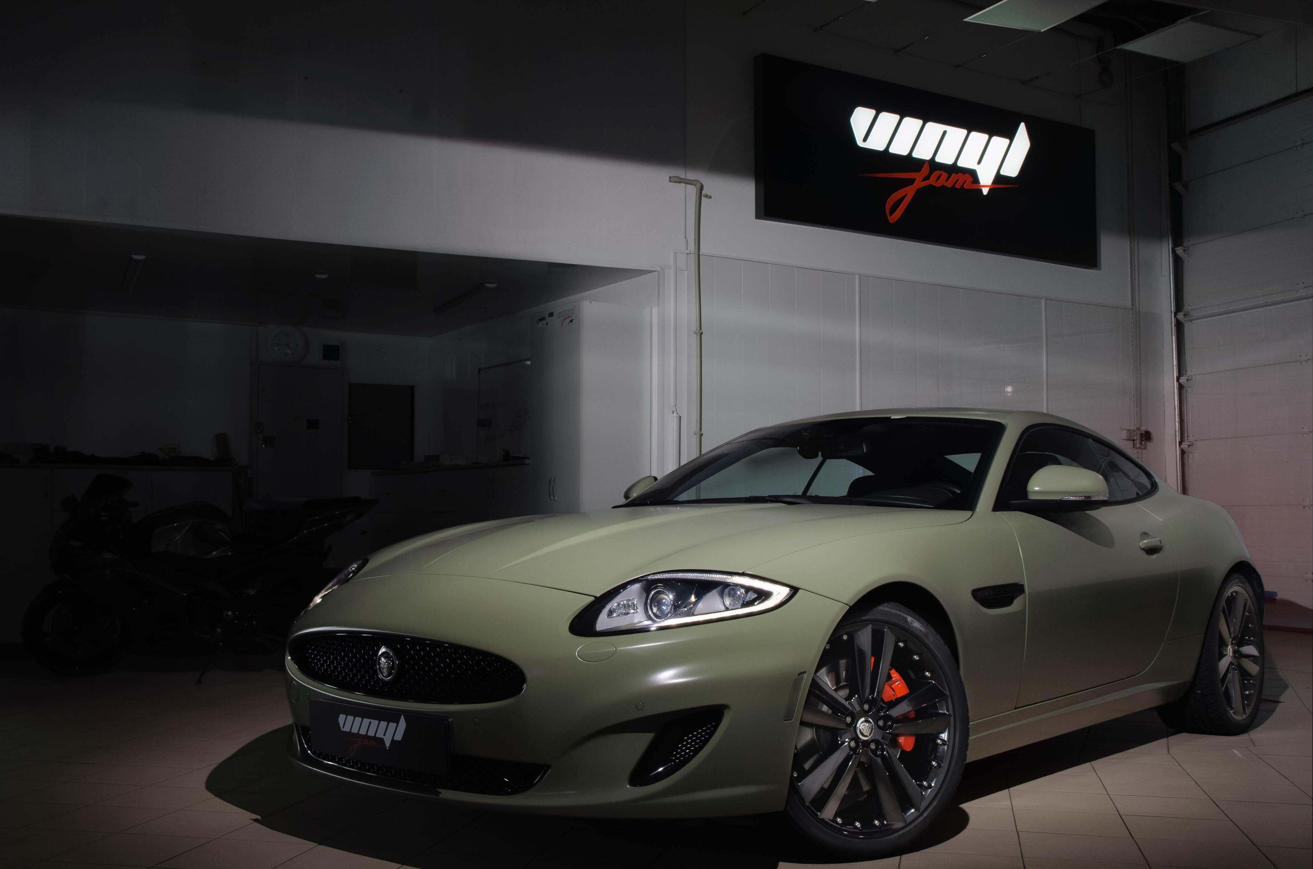 18. Jaguar xk khaki green satin