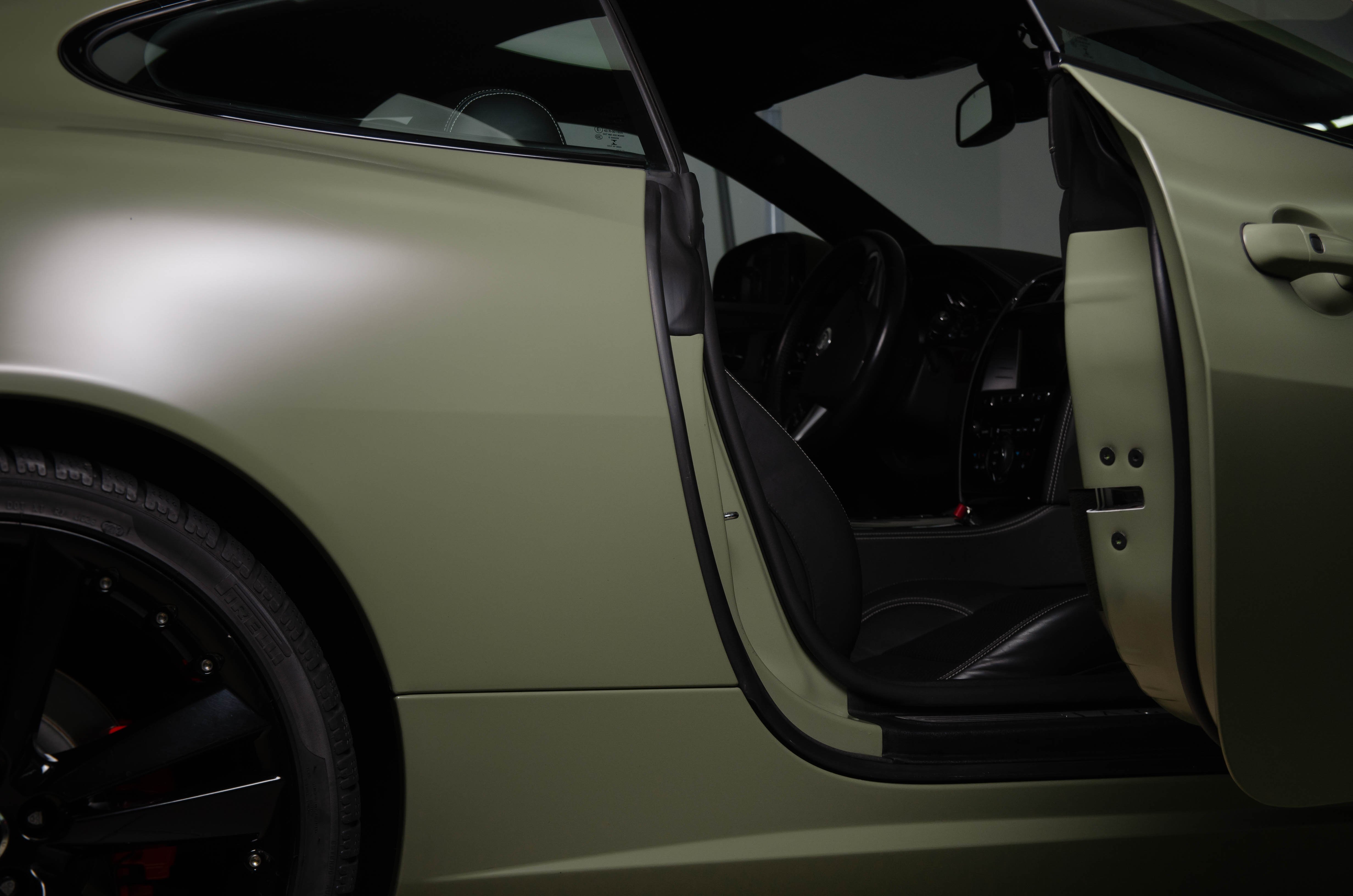 18. Jaguar xk khaki green satin
